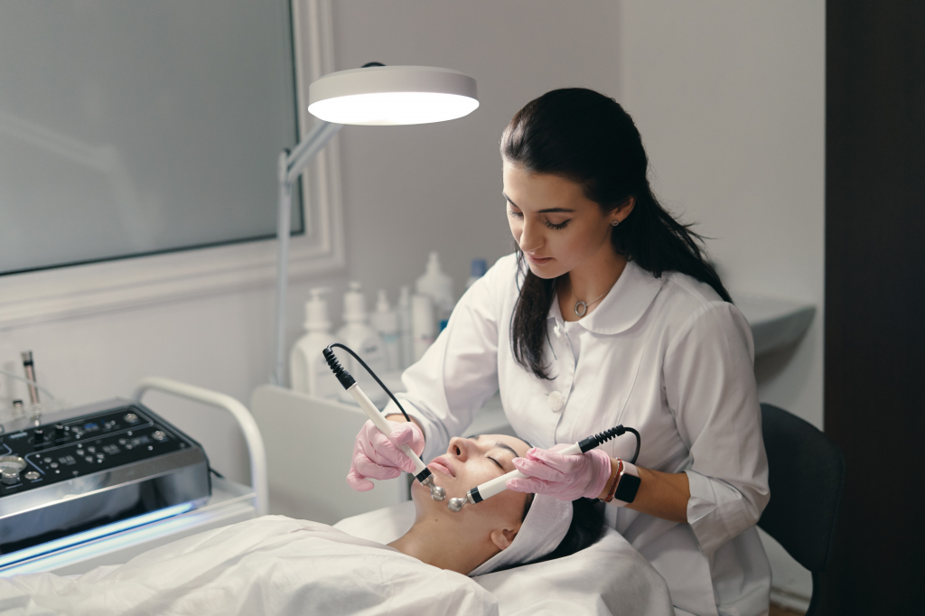 Pigmentation Treatment at an aesthetic clinic with advanced facial skin rejuvenation procedure performed by a skincare professional.